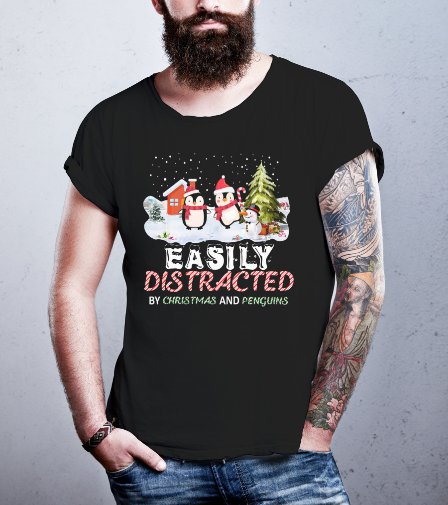 Easily Distracted By Christmas And Penguins In Winter Wonderland With Snowman House And Tree T-Shirt