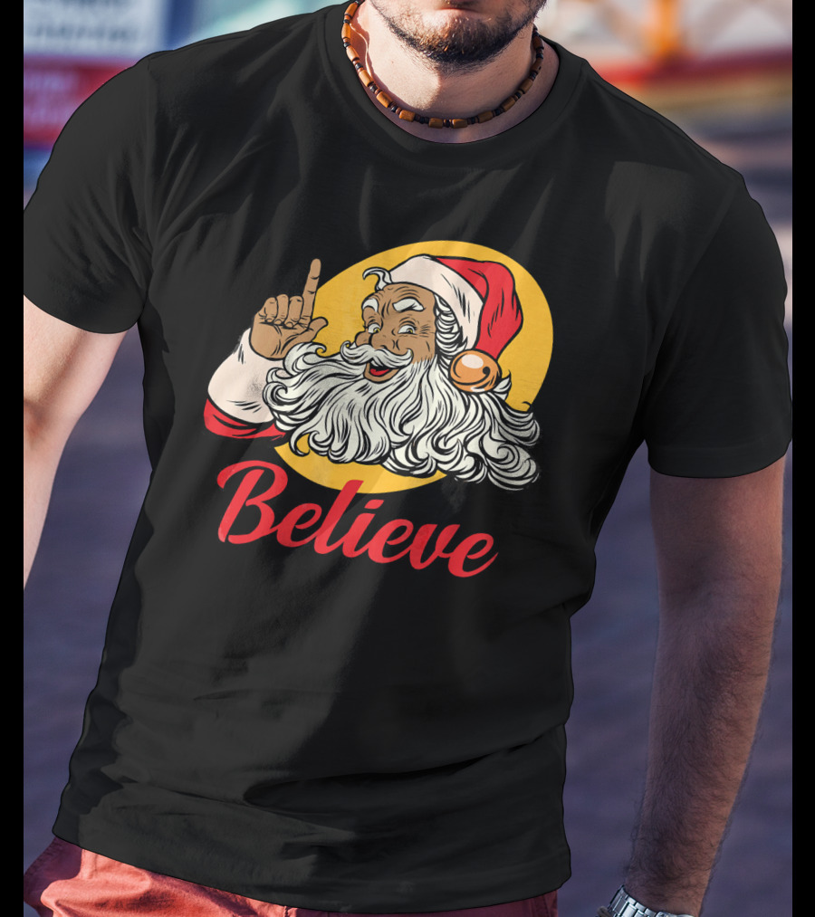 Black Santa Claus With Believe Caption And Yellow Background T-Shirt