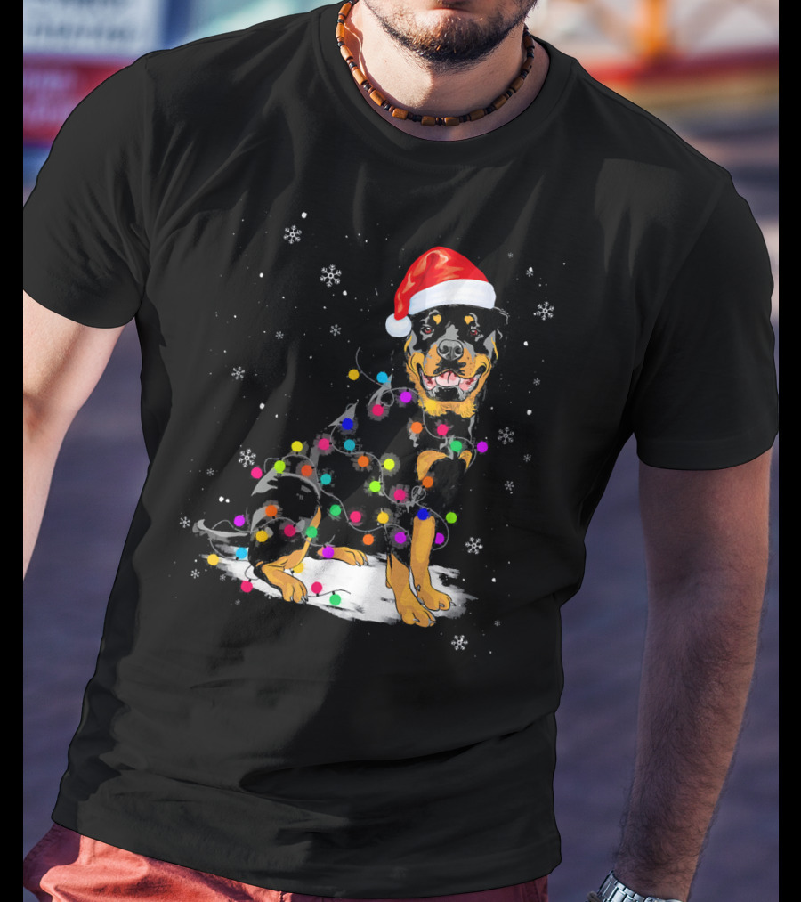 Rottweiler With Santa Hat And Colorful Christmas Lights In Snowy Scene T-Shirt