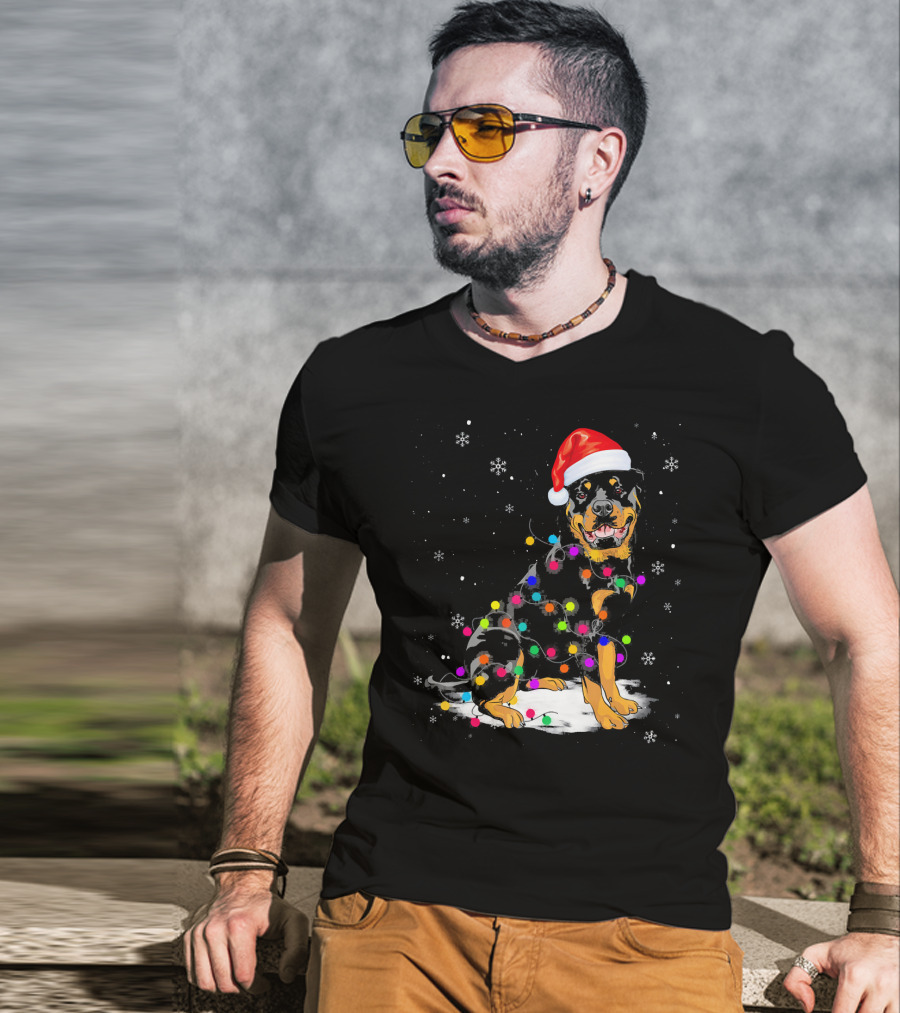 Rottweiler With Santa Hat And Colorful Christmas Lights In Snowy Scene T-Shirt