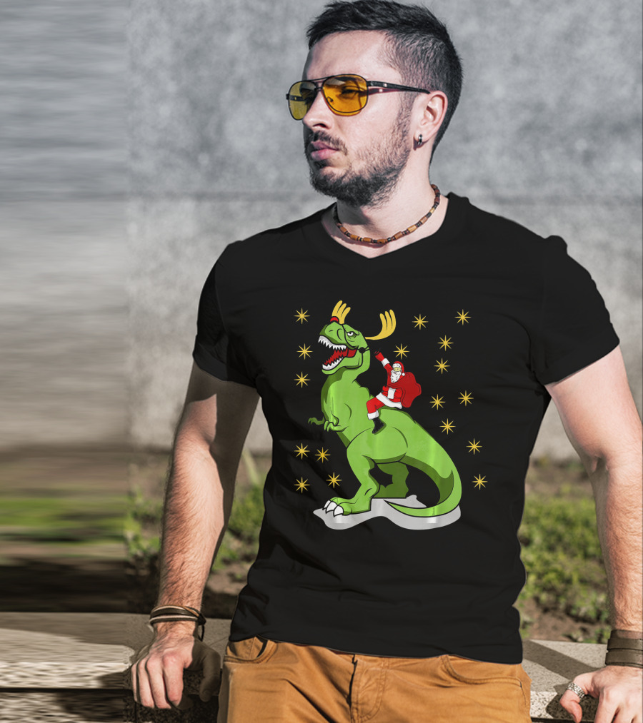 Santa Claus Riding Dinosaur With Reindeer Antlers And Stars T-Shirt