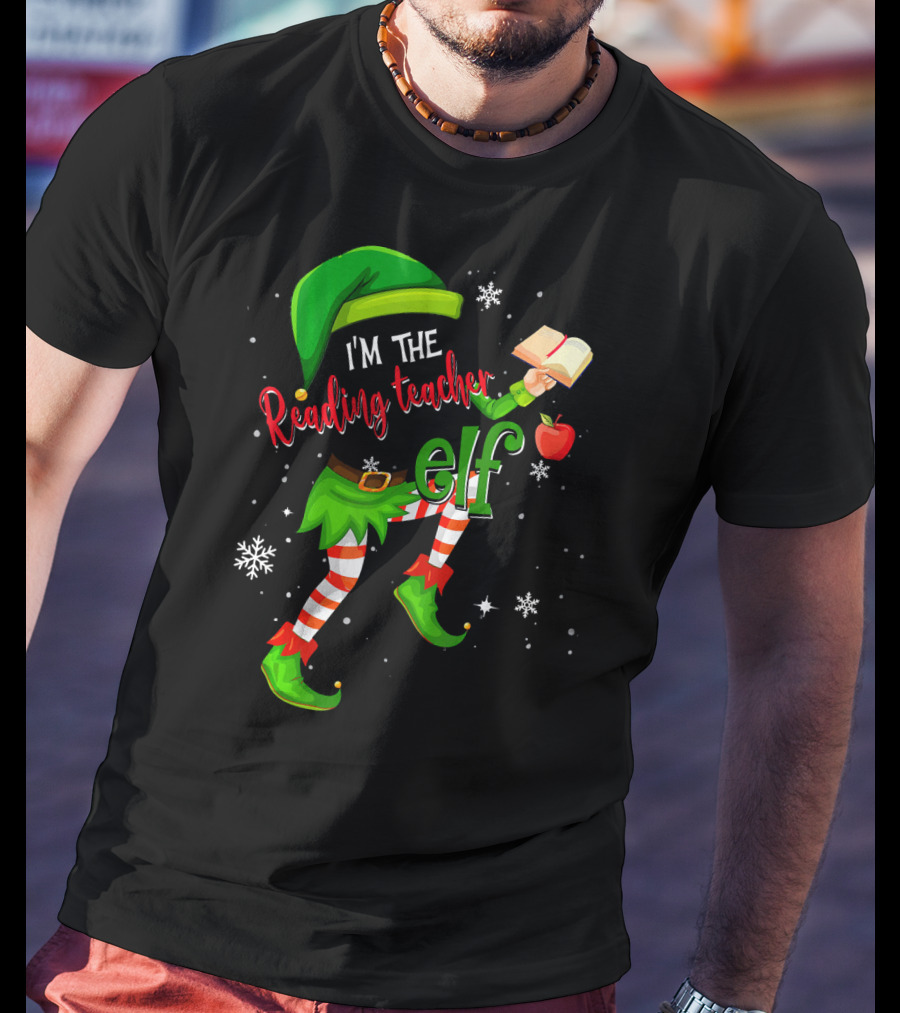 I'm The Reading Teacher Elf Holding Book Apple Wearing Elf Outfit Snowflakes T-Shirt