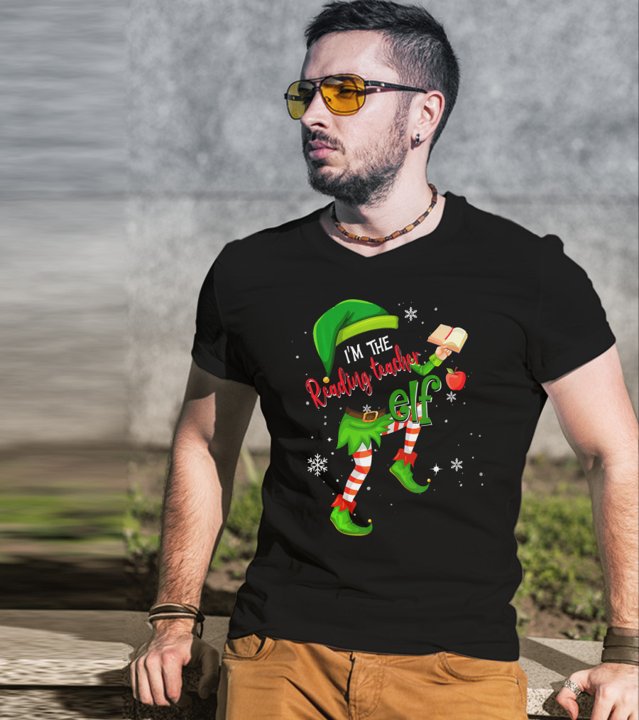 I'm The Reading Teacher Elf Holding Book Apple Wearing Elf Outfit Snowflakes T-Shirt