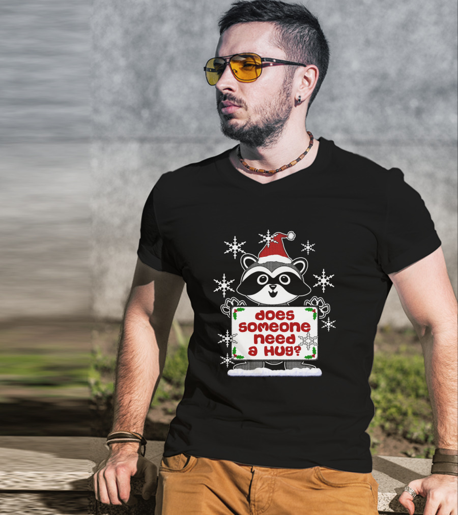 Does Someone Need A Hug Cute Ugly Christmas Raccoon With Santa Hat And Snowflakes T-Shirt