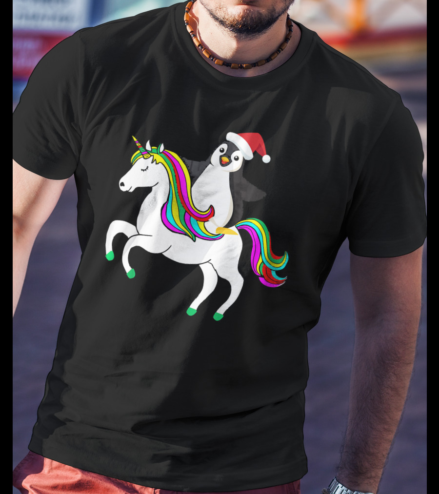 Penguin In Santa Hat Riding A Rainbow Unicorn T-Shirt