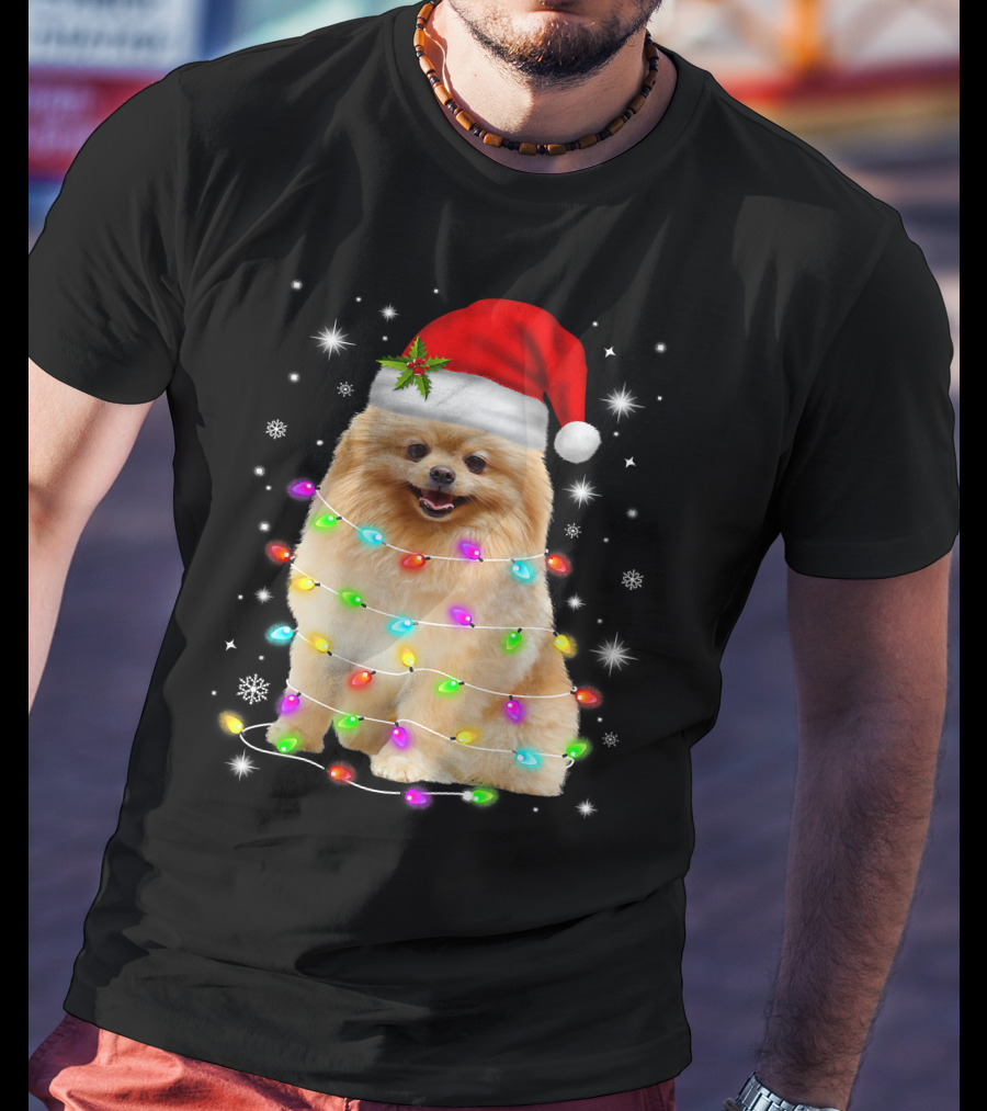 Pomeranian Pup Wrapped In Christmas Lights With Santa Hat And Festive Glow T-Shirt