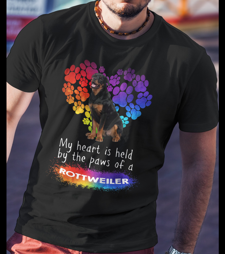 My Heart Is Held By The Paws Of A Rottweiler Rainbow Paw Print Heart T-Shirt
