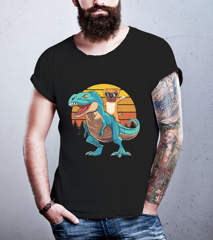 Boxer Dog With Sunglasses Riding Blue T-Rex Against Sunset Background T-Shirt